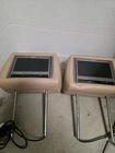 Audiovox Movies 2 Go Dual Dvd Headrest System Model MMD7HRPKG - Open Box New For. Price: $80.00.