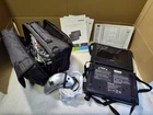 Polaroid DPA-08055S 8" Color Twin Screens Dvd Player W/ Handheld Controller Open. Price: $49.95.