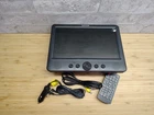 Wonnie W-1011 10.5" Single Car Dvd Player Portable Headrest W/ Controller Used. Price: $49.99.