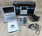 Polaroid Portable Dvd Player W/remote PDV-0700 Silver Works Original Box Manual Used. Price: $74.00.