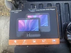 Fangor 7.5 Dual Screen Portable Car Dvd Player F-611 New. Price: $30.00.