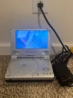 Vintage Polaroid PDV-0713B Portable Dvd Player 7" Tested Used. Price: $44.00.