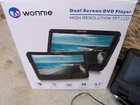 Wonnie W-1014 Dual Screen Dvd Player For Car, High Resolution Tft Lcd Used. Price: $49.99.