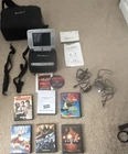 Eddie Bauer ME20 Portable Player 7" Lcd W/ Accessories & Dvds Open. Price: $65.00.