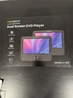 Dual Screen Dvd Player (fangor Model: F-611) New Open Box. Price: $58.00.