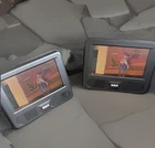 Rca DRC69705 7-INCH Dual Screen Mobile Dvd Player System Open. Price: $59.95.